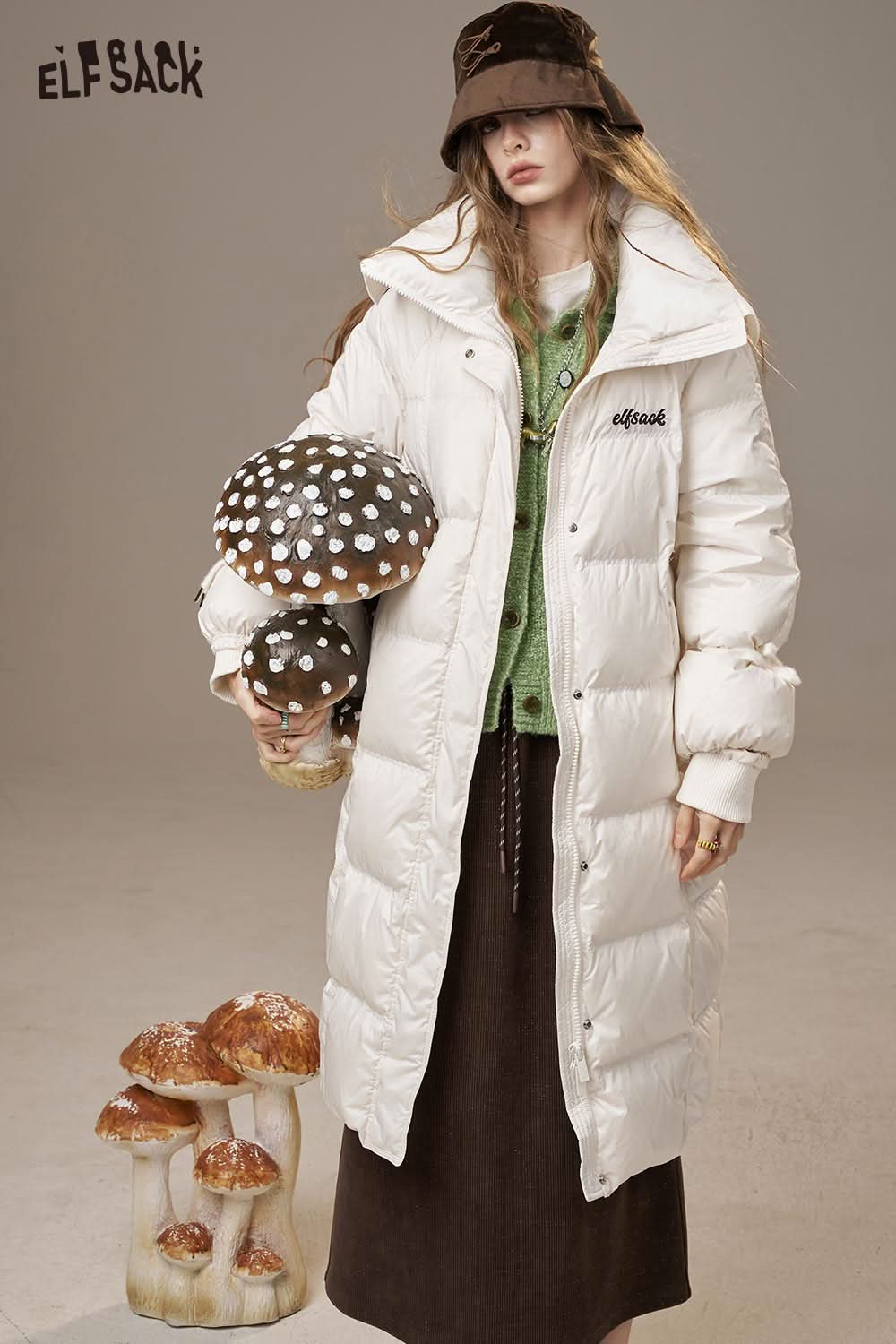 ELFSACK minimalist knit cardigan for women layered under a stylish puffer jacket