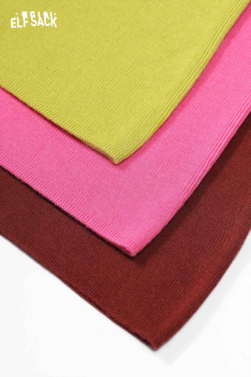 Colorful ELFSACK minimalist knit pullover for women in pink, green, and brown shades.