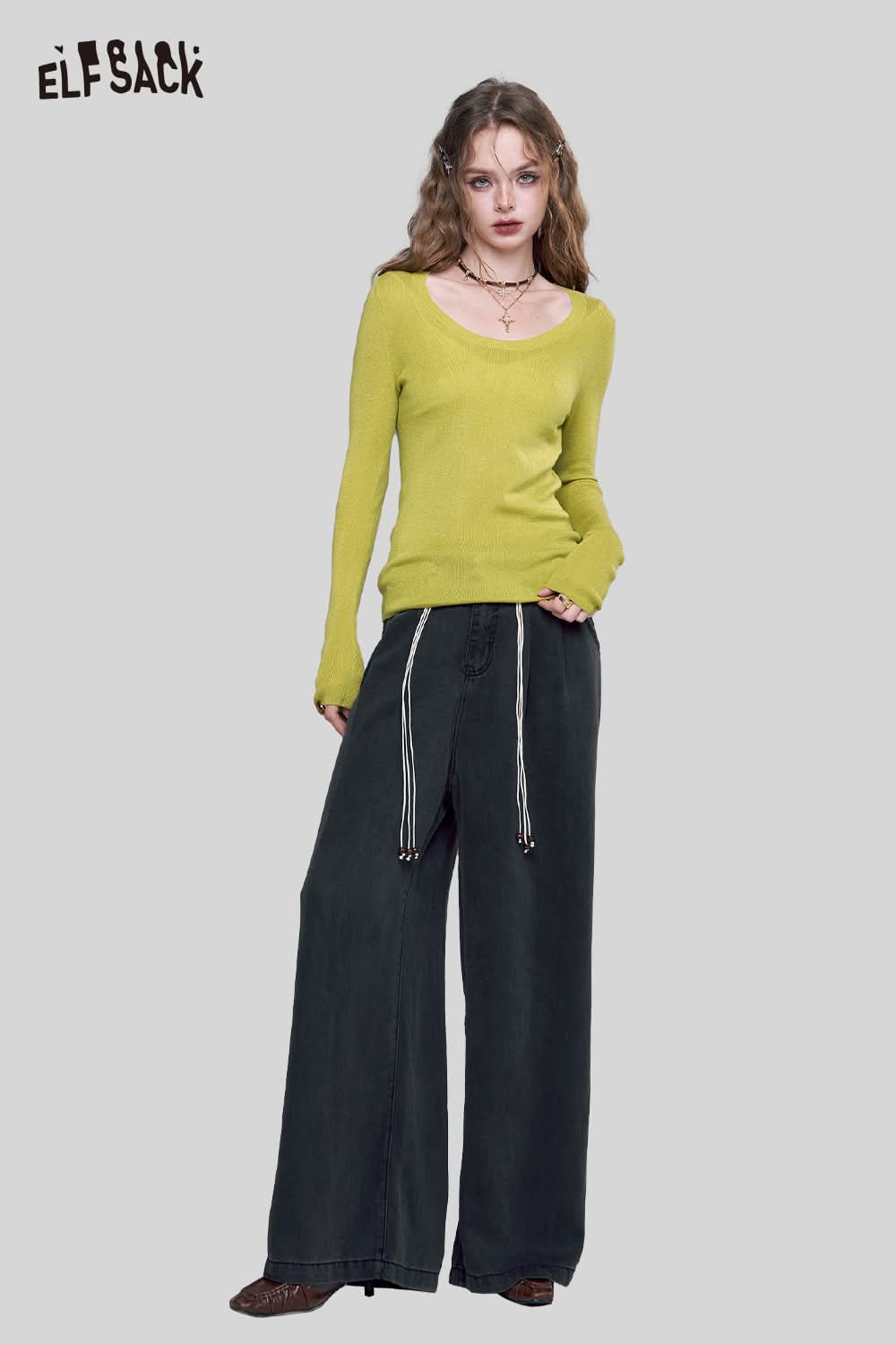 ELFSACK minimalist knit pullover for women in vibrant green paired with wide-leg black pants