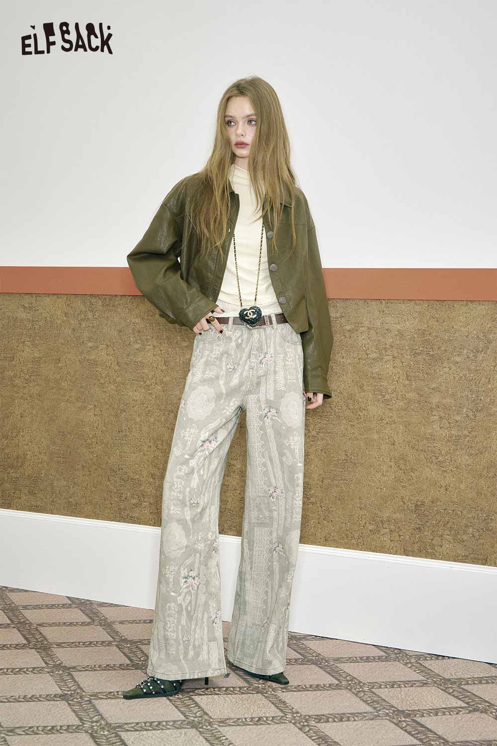 Model wearing a minimalist lace panel long sleeve tee styled with wide-leg pants and a jacket