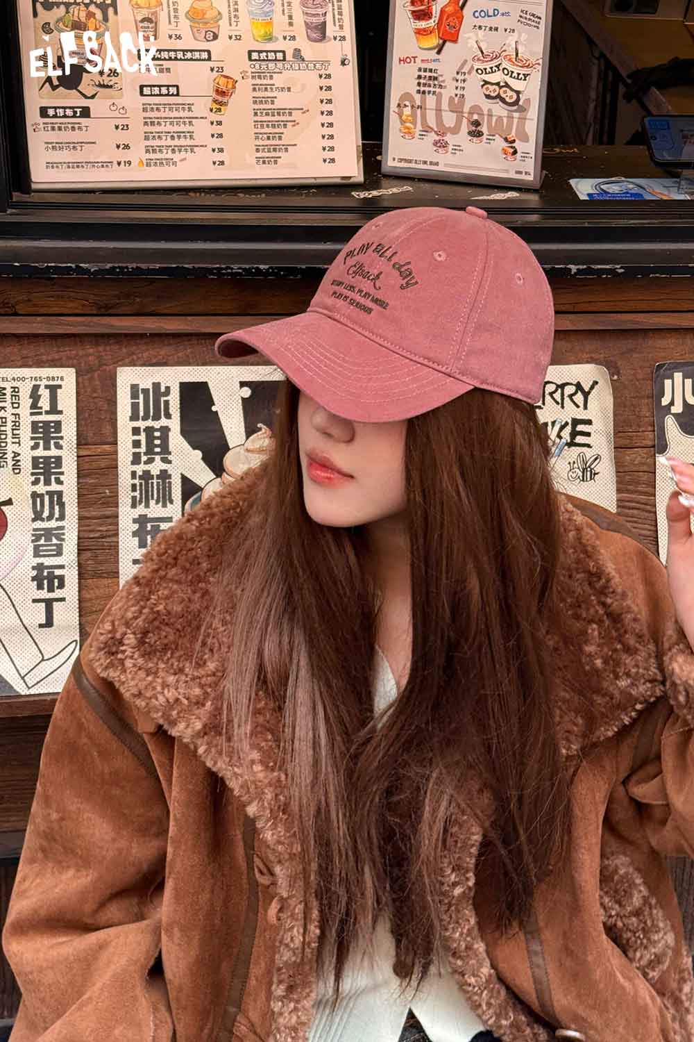 ELFSACK minimalist letter embroidered baseball cap in pink worn with a stylish brown fur coat