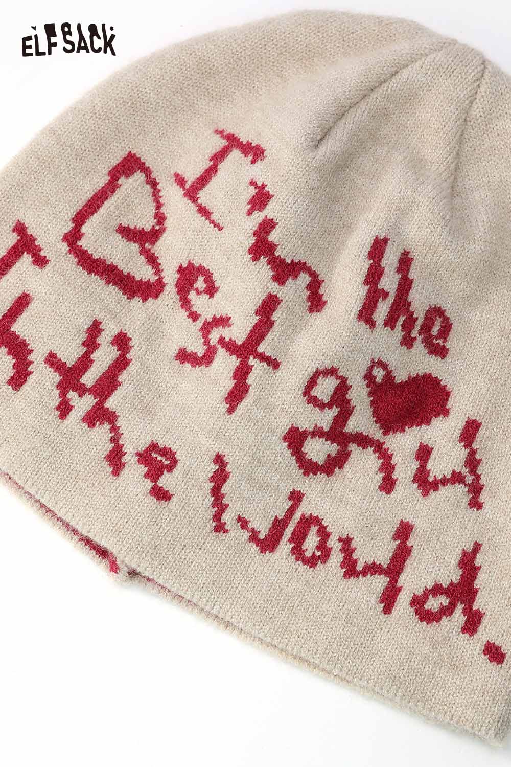 ELFSACK minimalist letter graphic beanie in beige with red text for a trendy look