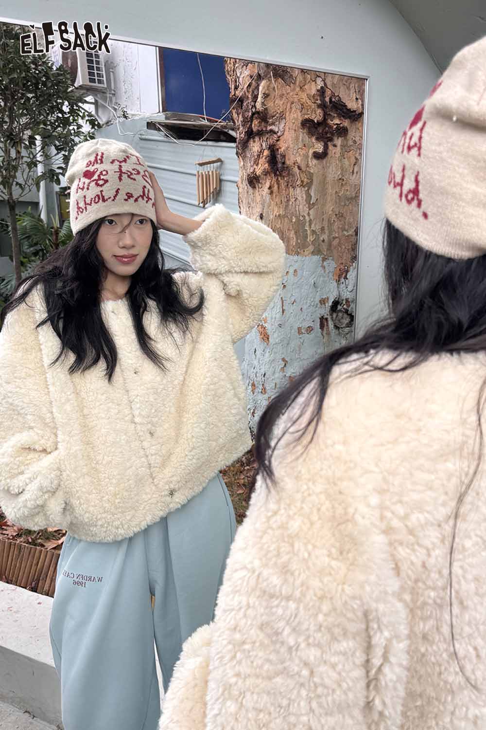 ELFSACK minimalist letter graphic beanie worn by a model with a cozy faux fur jacket