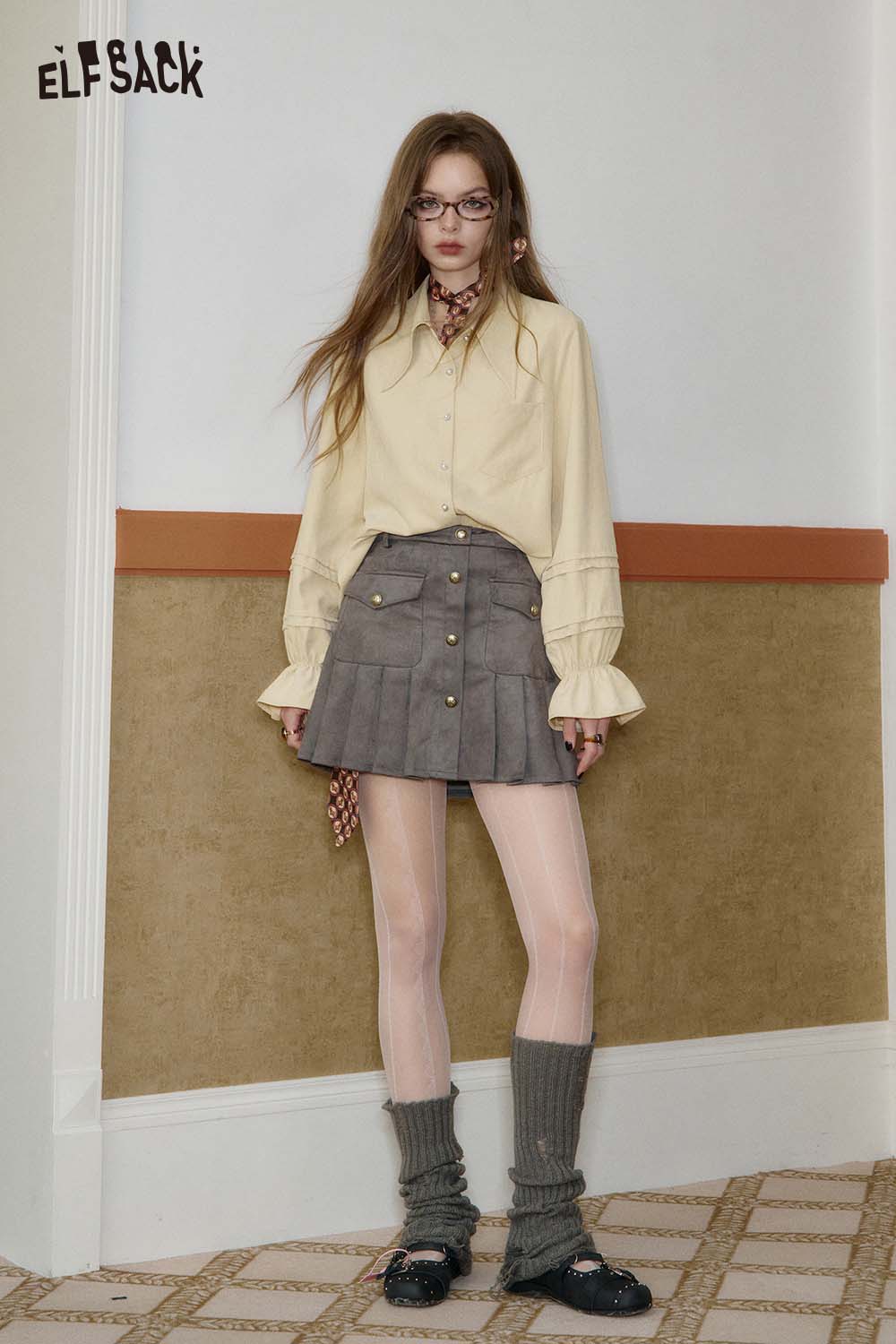 ELFSACK minimalist peplum blouse paired with a chic skirt for a stylish women's outfit