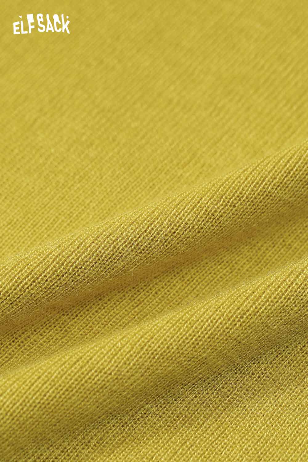Close-up of soft yellow fabric featuring a minimalist slim fit top for women from ELFSACK