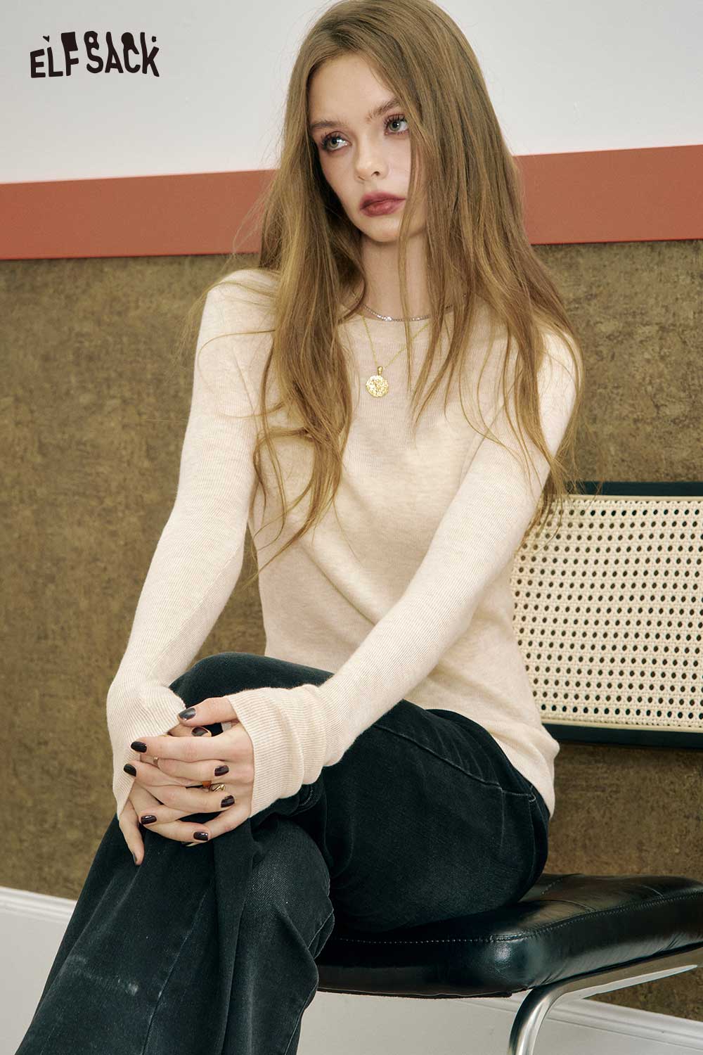 ELFSACK minimalist slim fit top for women in soft beige, styled with black pants for a chic look