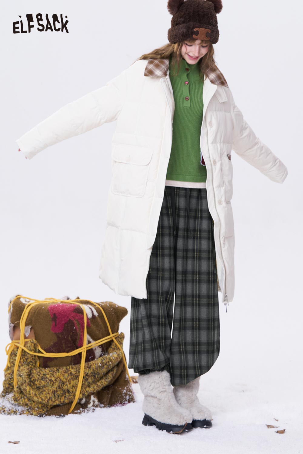 ELFSACK minimalist stripe wide leg pants paired with a cozy green top and white puffer coat