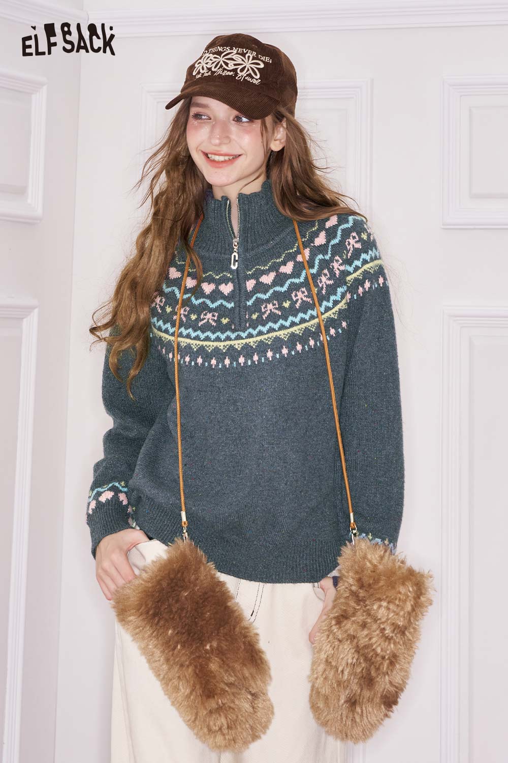 ELFSACK minimalist stripe zipper sweater in blue with colorful patterns and half zip design