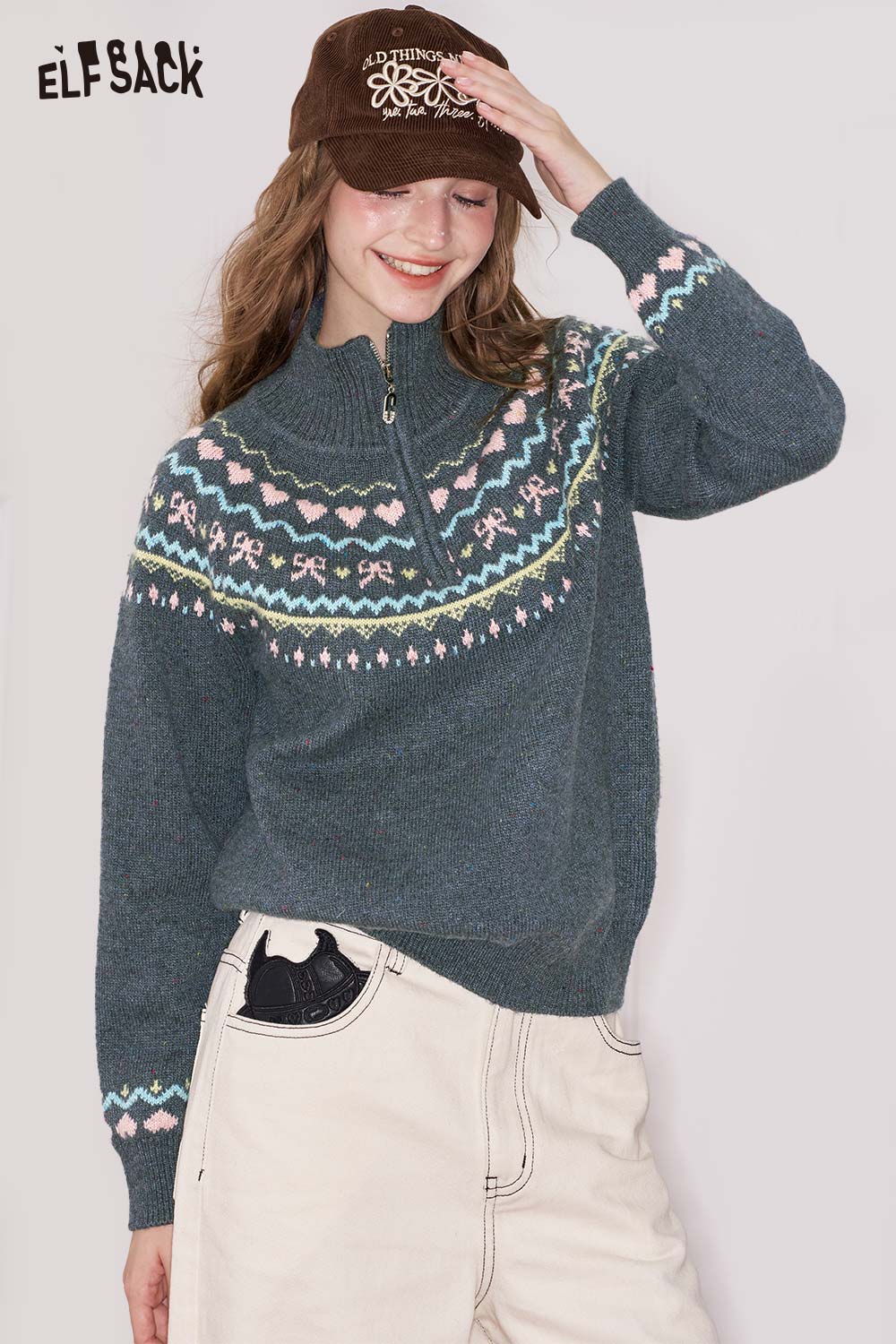 ELFSACK minimalist stripe zipper sweater in teal with colorful patterned design and high collar
