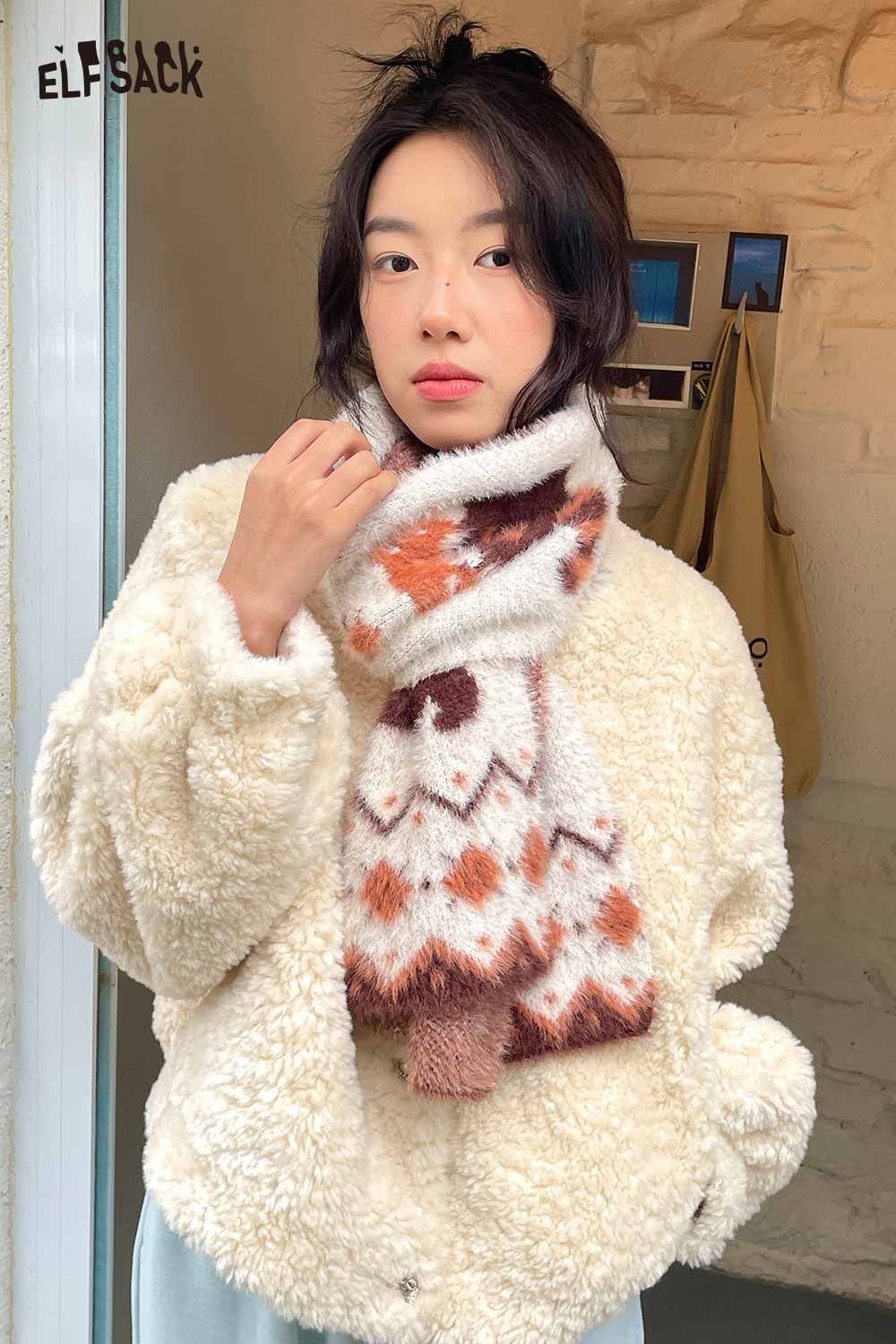 ELFSACK Minimalist Striped Graphic Scarf in soft fabric worn with a cozy cream jacket