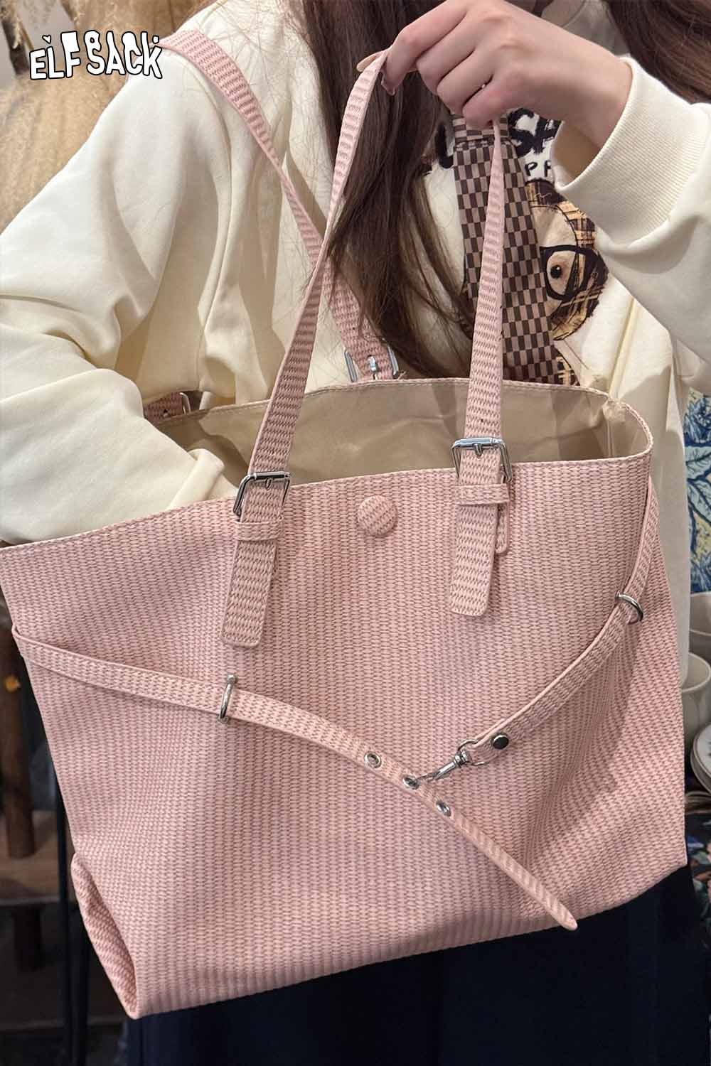 ELFSACK minimalist tote bag for women in soft pink fabric with adjustable straps and chic design