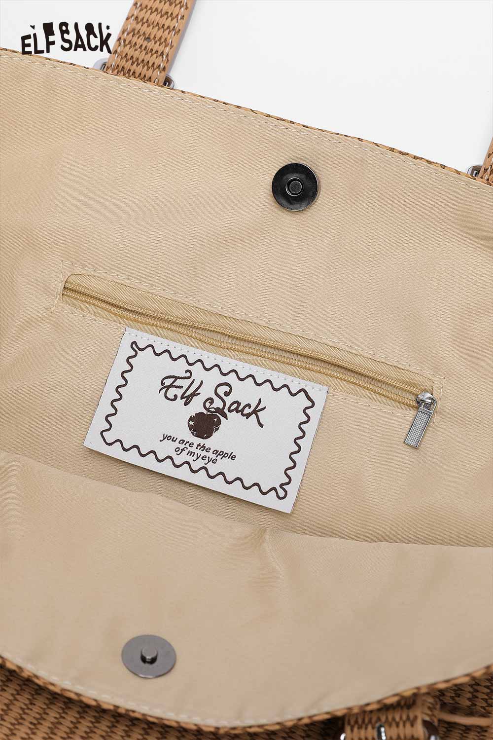 Interior view of ELFSACK minimalist tote bag for women with zip pocket and stylish design