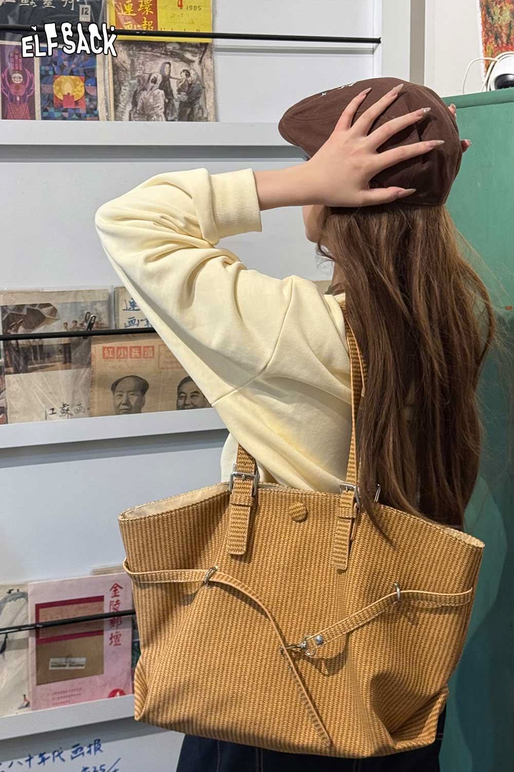 Chic ELFSACK minimalist tote bag for women in mustard color, paired with casual attire
