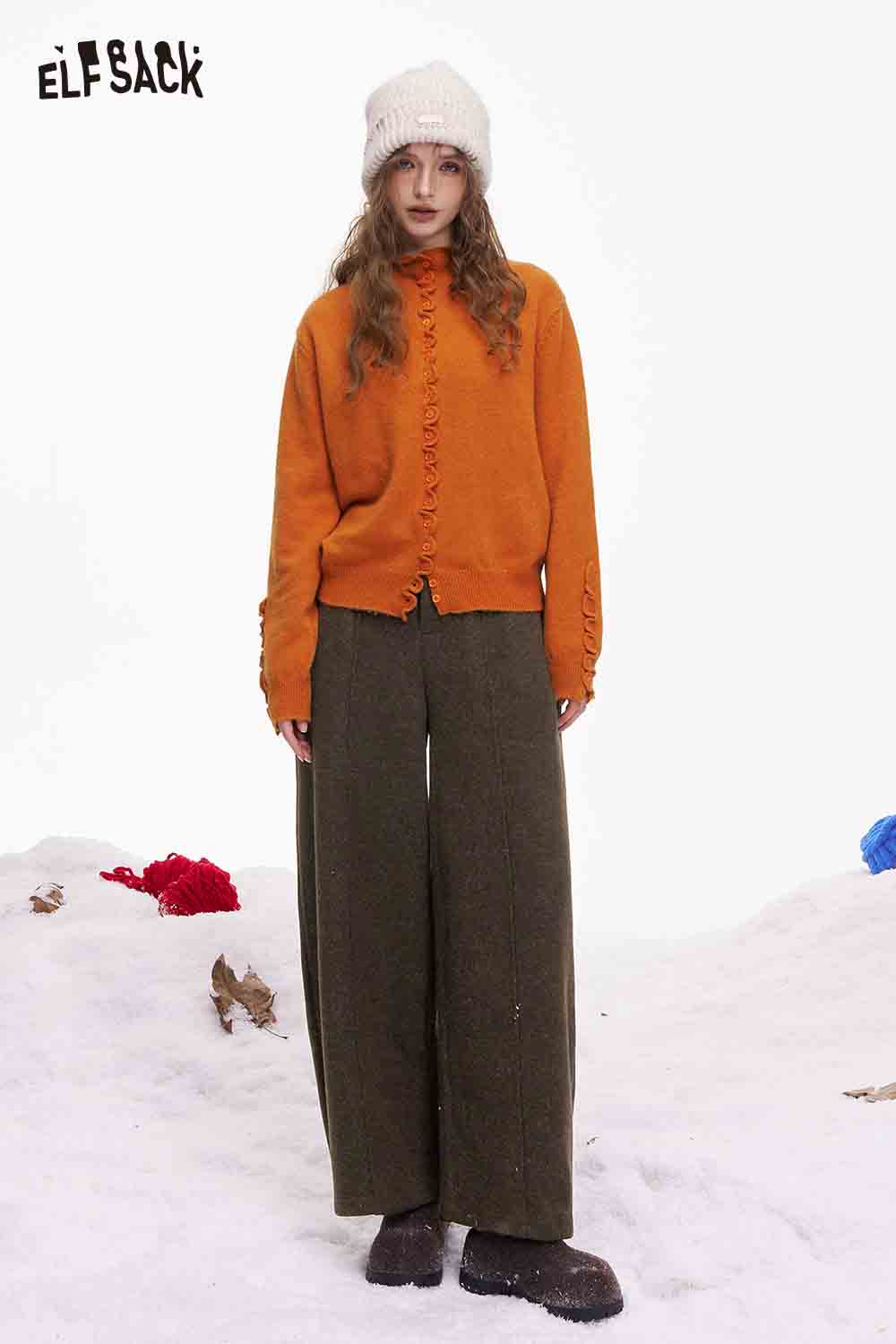 Stylish ELFSACK minimalist wide leg pants women in olive green paired with a cozy orange sweater