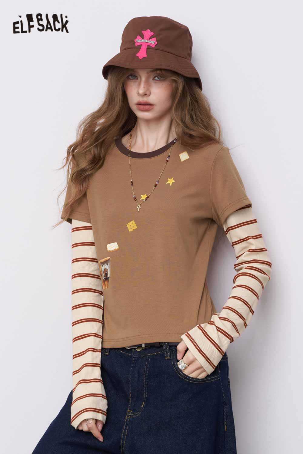 Model wearing ELFSACK slim fit stripe patchwork top brown short sleeve layered over striped long sleeves