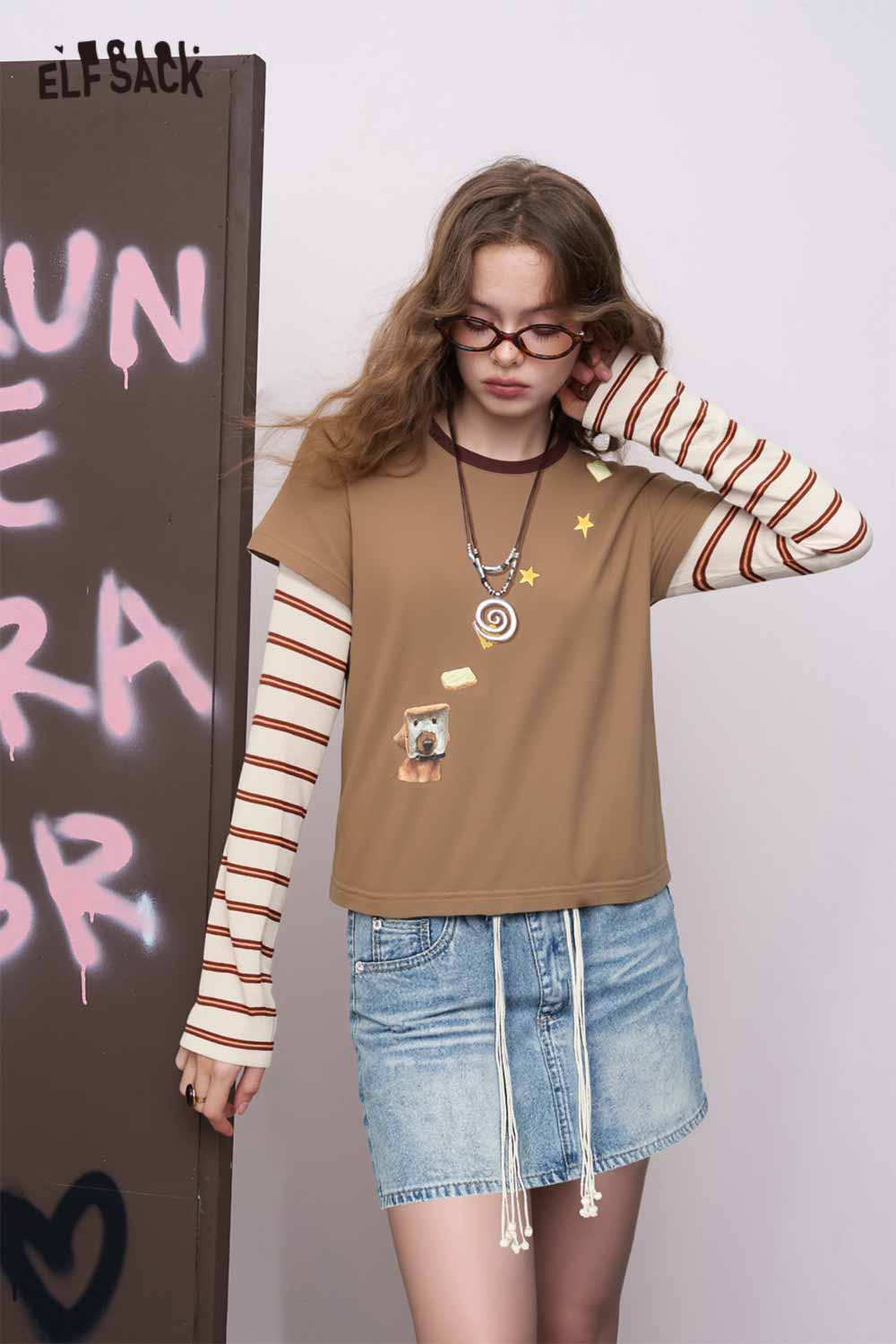 ELFSACK slim fit stripe patchwork top brown layered tee with cream red striped sleeves worn with denim skirt