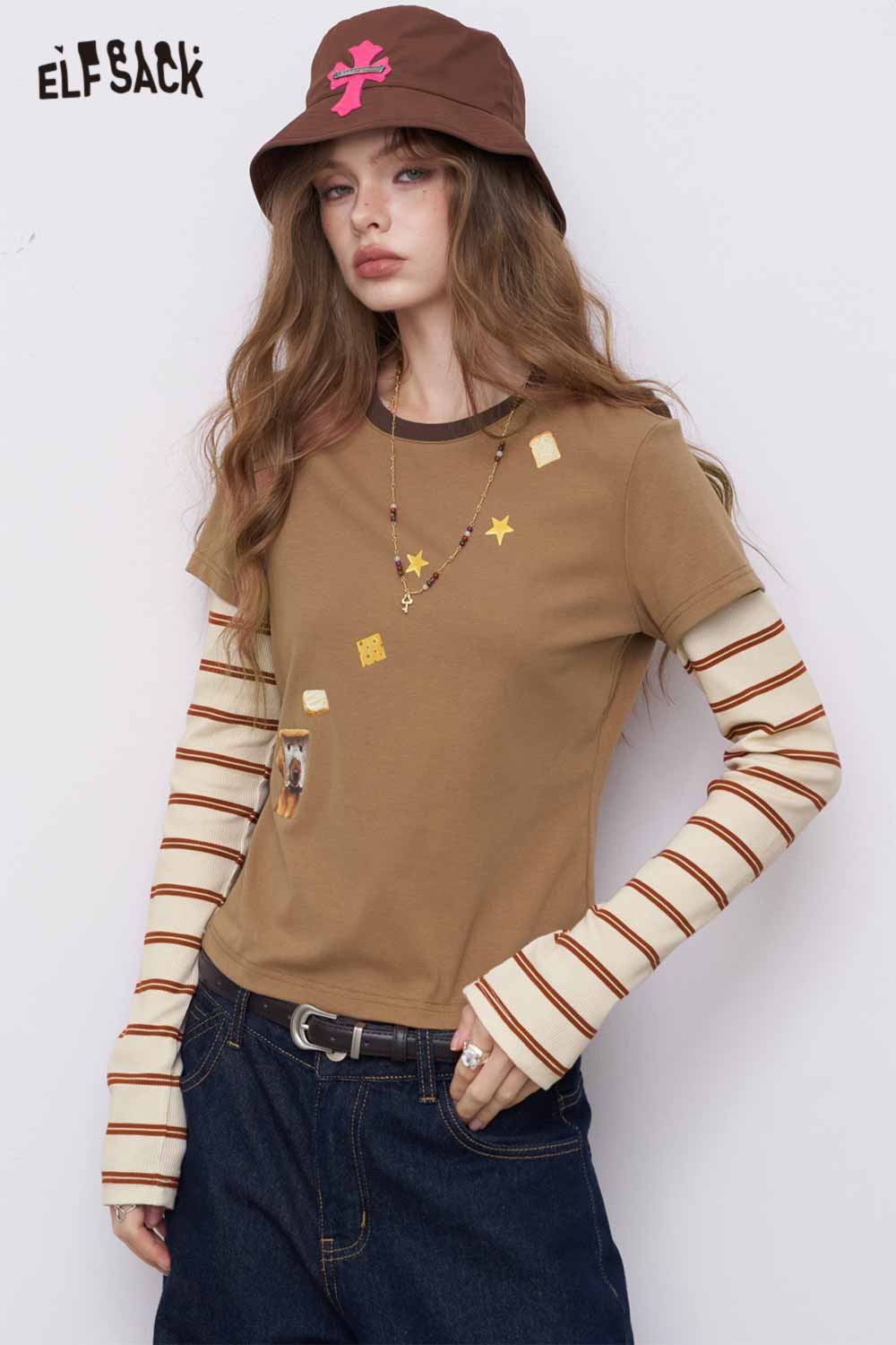 ELFSACK model wearing slim fit stripe patchwork top in brown with cream striped sleeves and patch details