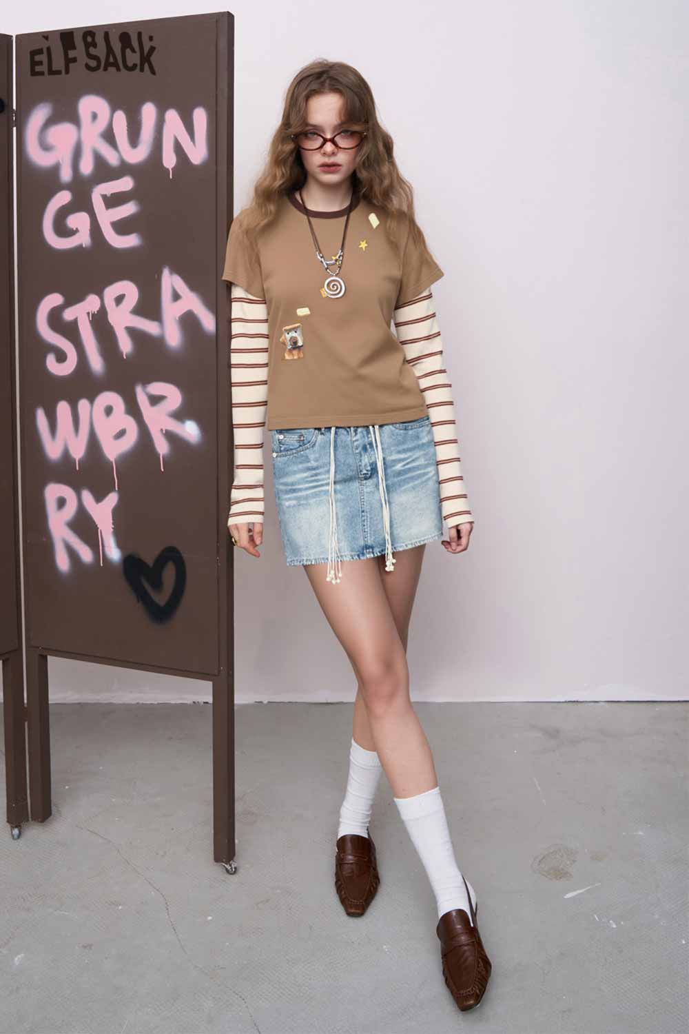 ELFSACK slim fit stripe patchwork top layered over striped long sleeves worn with denim mini skirt