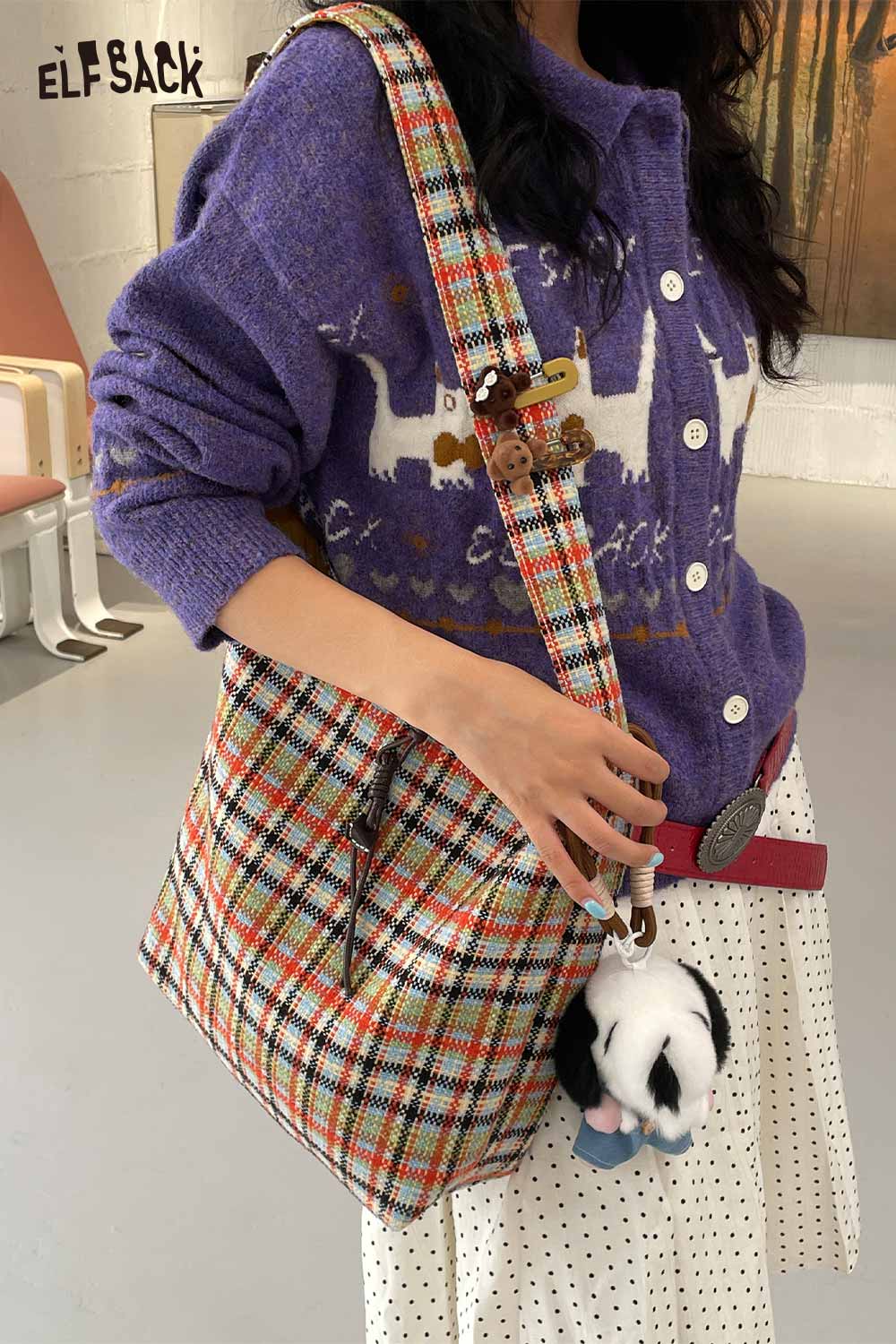 ELFSACK multi color checkered shoulder bag styled with a cozy sweater and playful accessories