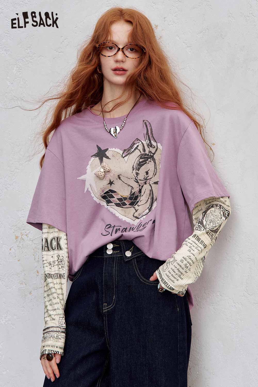 ELFSACK newsprint graphic drop shoulder tee in lavender with unique design and relaxed fit for casual wear