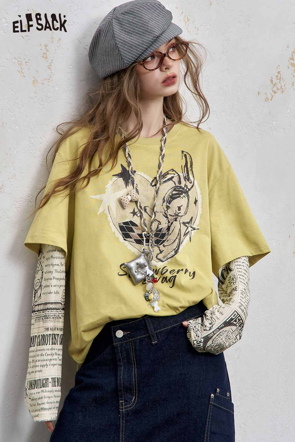 ELFSACK newsprint graphic drop shoulder tee in yellow with unique design and relaxed fit