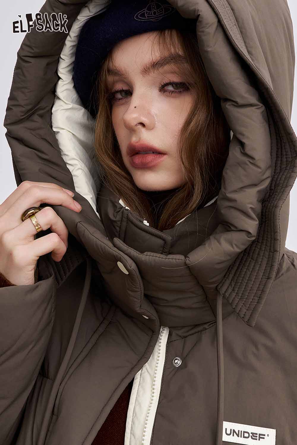 ELFSACK nylon collar down jacket for women featuring a stylish oversized hood and warm insulation