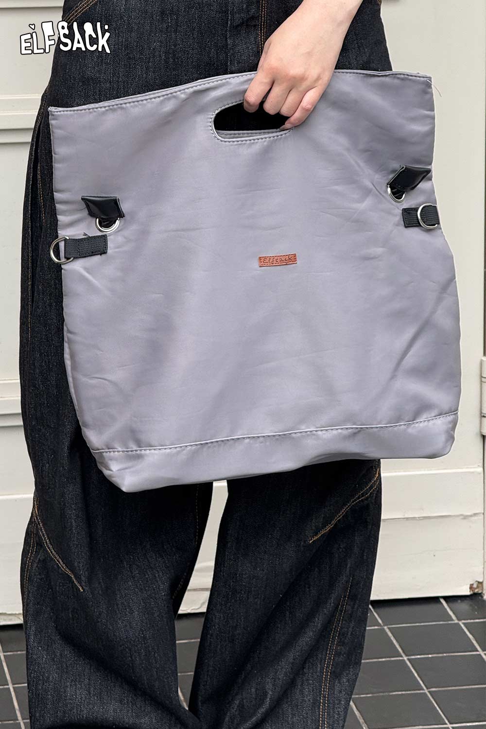 Gray oversized nylon tote bag by ELFSACK with stylish cutout handles and adjustable straps