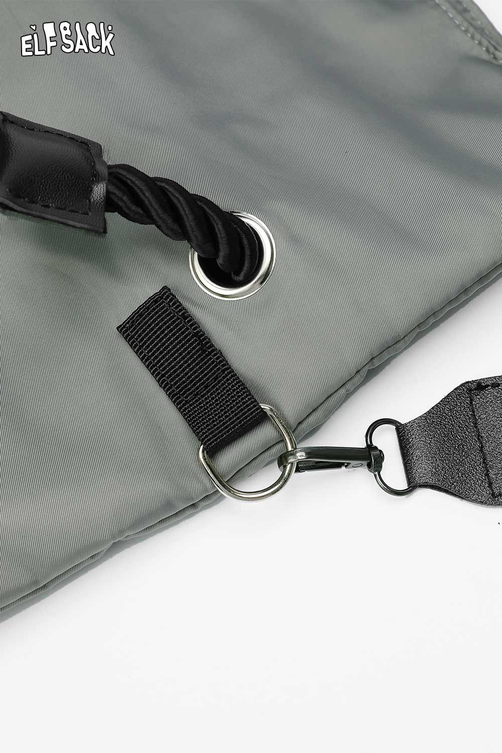 Close-up of ELFSACK oversized nylon tote bag with durable handle and metal detailing