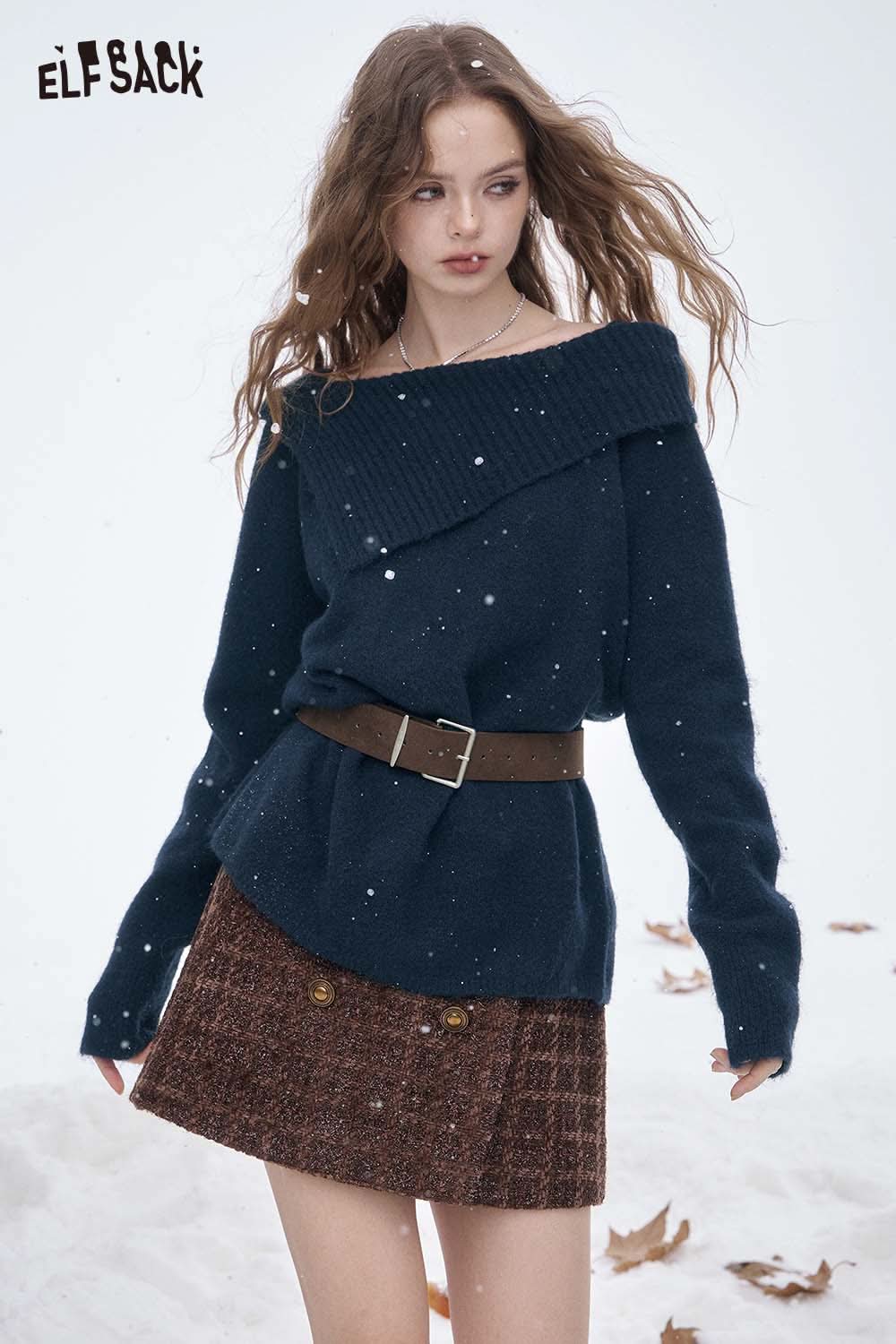ELFSACK off shoulder knit sweater for women in dark blue, styled with a brown skirt and belt for winter fashion
