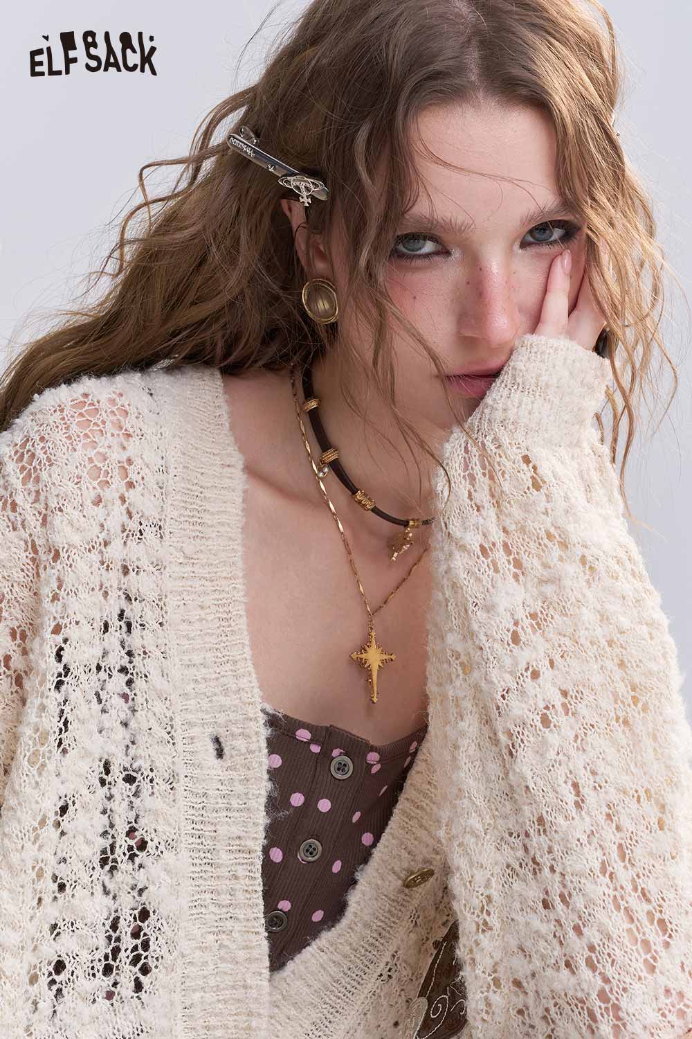 ELFSACK open knit cardigan with bows styled over a polka dot dress for a trendy layered look