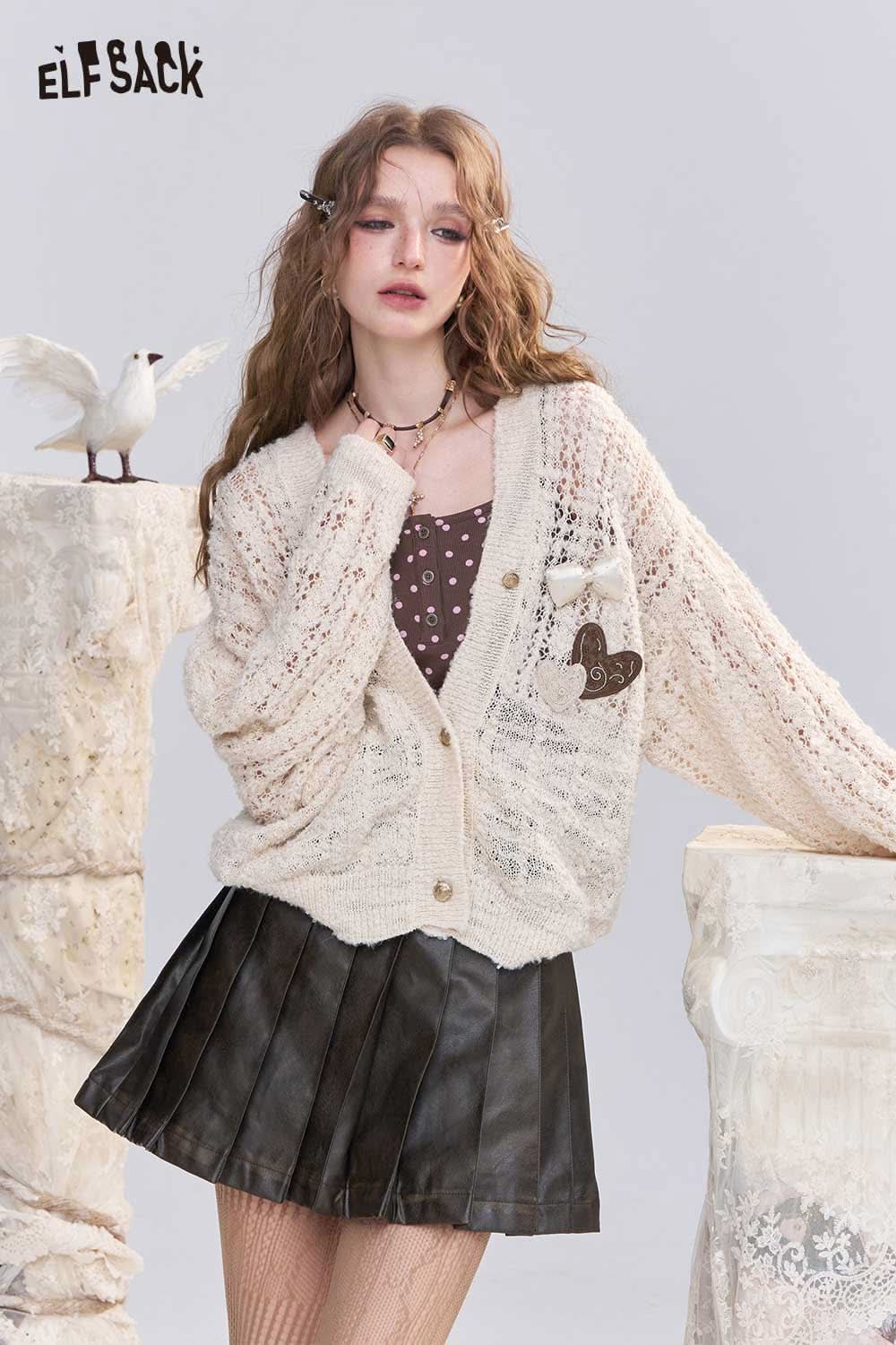 ELFSACK open knit cardigan with bows featuring a cozy design and relaxed fit for stylish layering