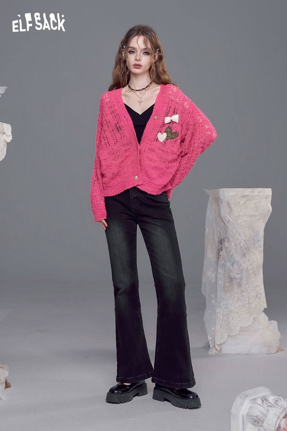 ELFSACK open knit cardigan with bows in vibrant pink, perfect for layering over casual outfits