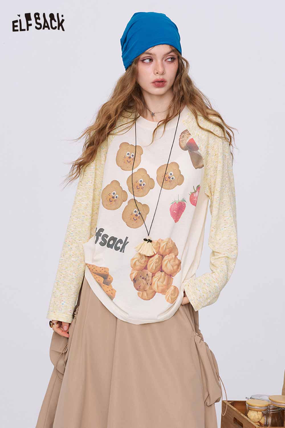 ELFSACK casual printed tee with yellow speckled raglan sleeves and cookie print colorblock raglan top for women