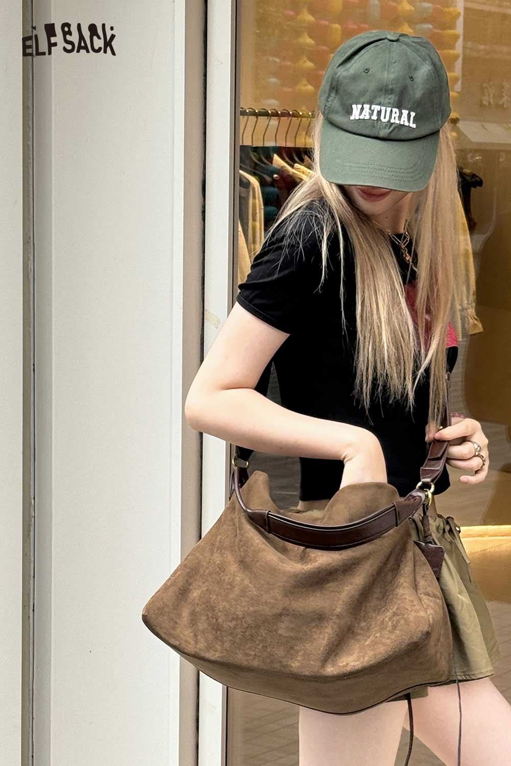 ELFSACK oversized tote bag for women in brown, paired with a casual outfit and cap