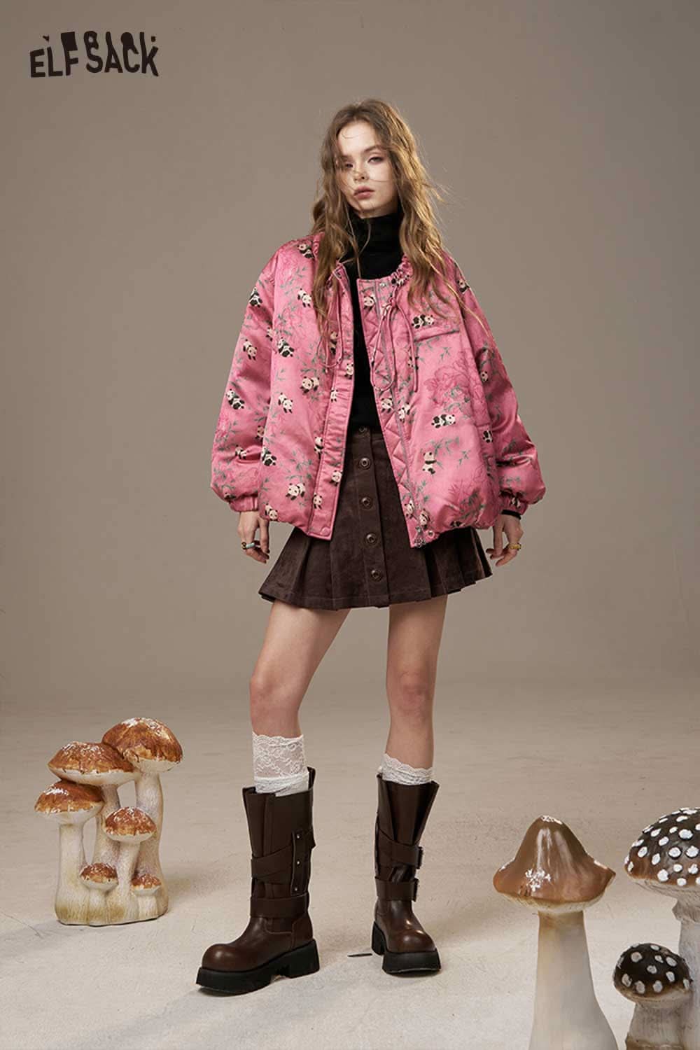 ELFSACK panda bamboo print down jacket in pink worn with a brown skirt and black boots