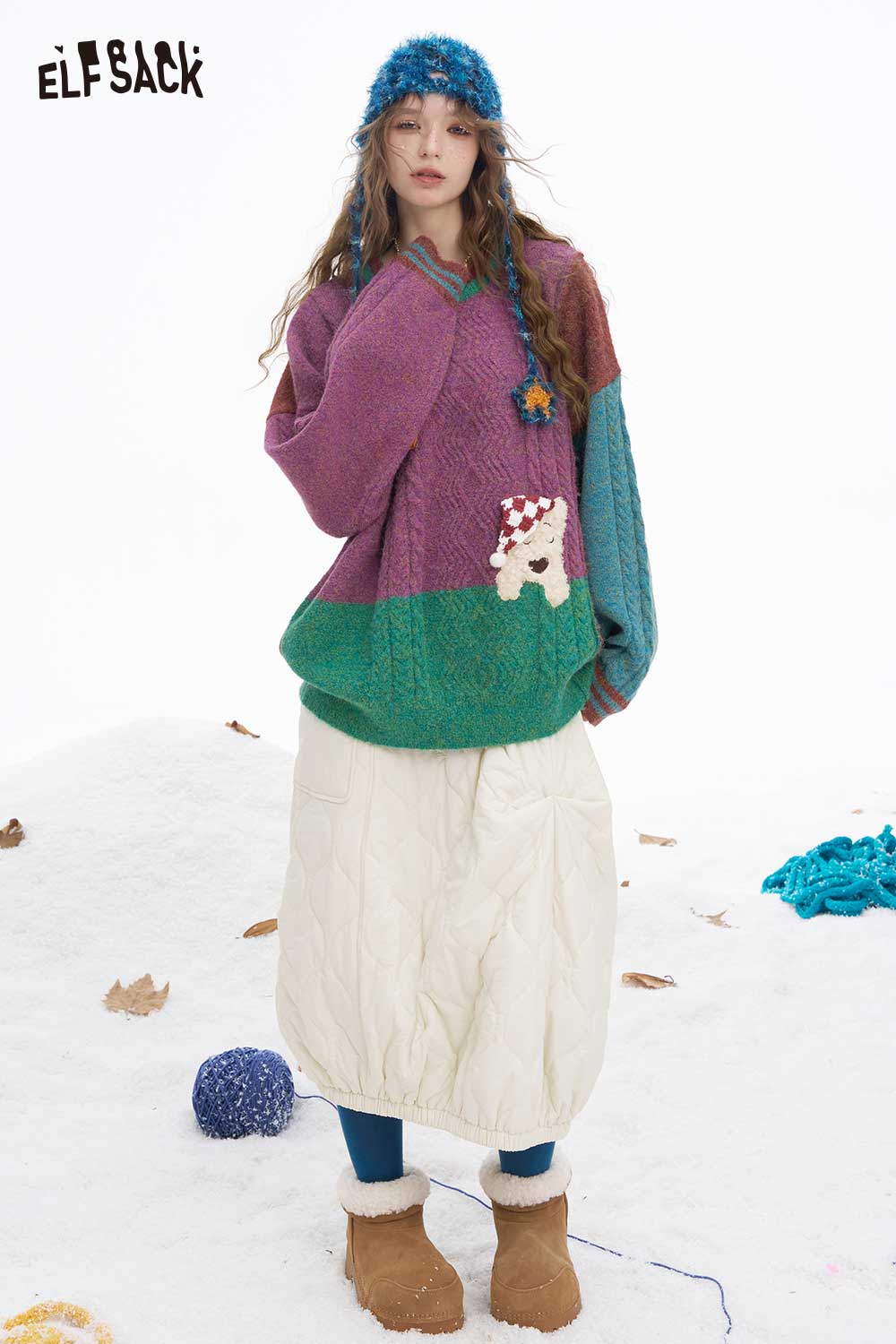 ELFSACK patchwork animal graphic sweater featuring colorful patterns and a playful design