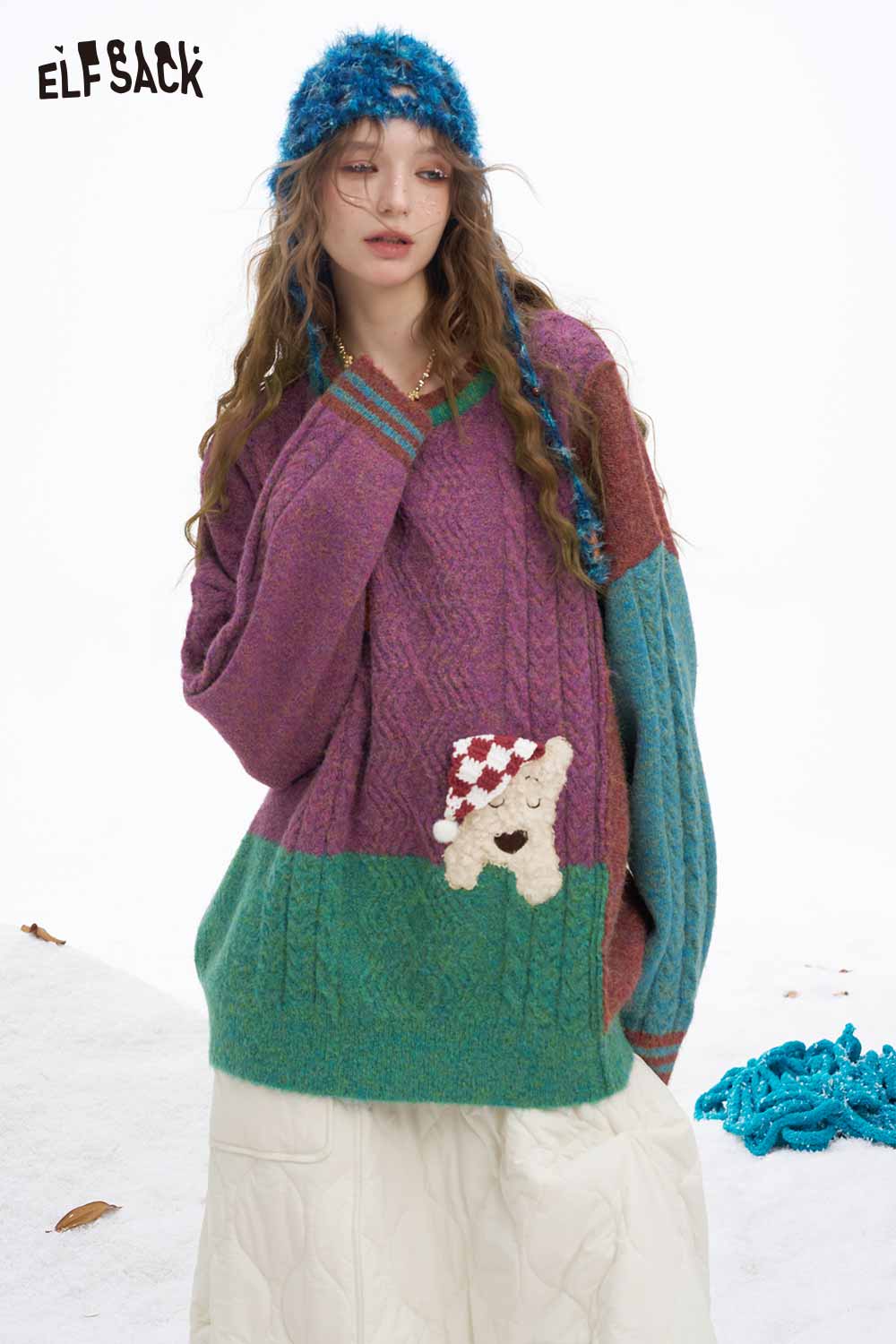 ELFSACK patchwork animal graphic sweater featuring colorful patterns and a playful bear design