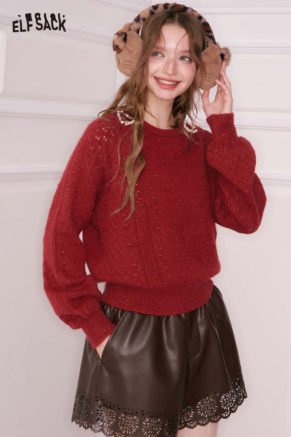 ELFSACK pearl embellished cropped sweater in red, paired with a black pleated skirt for a stylish look