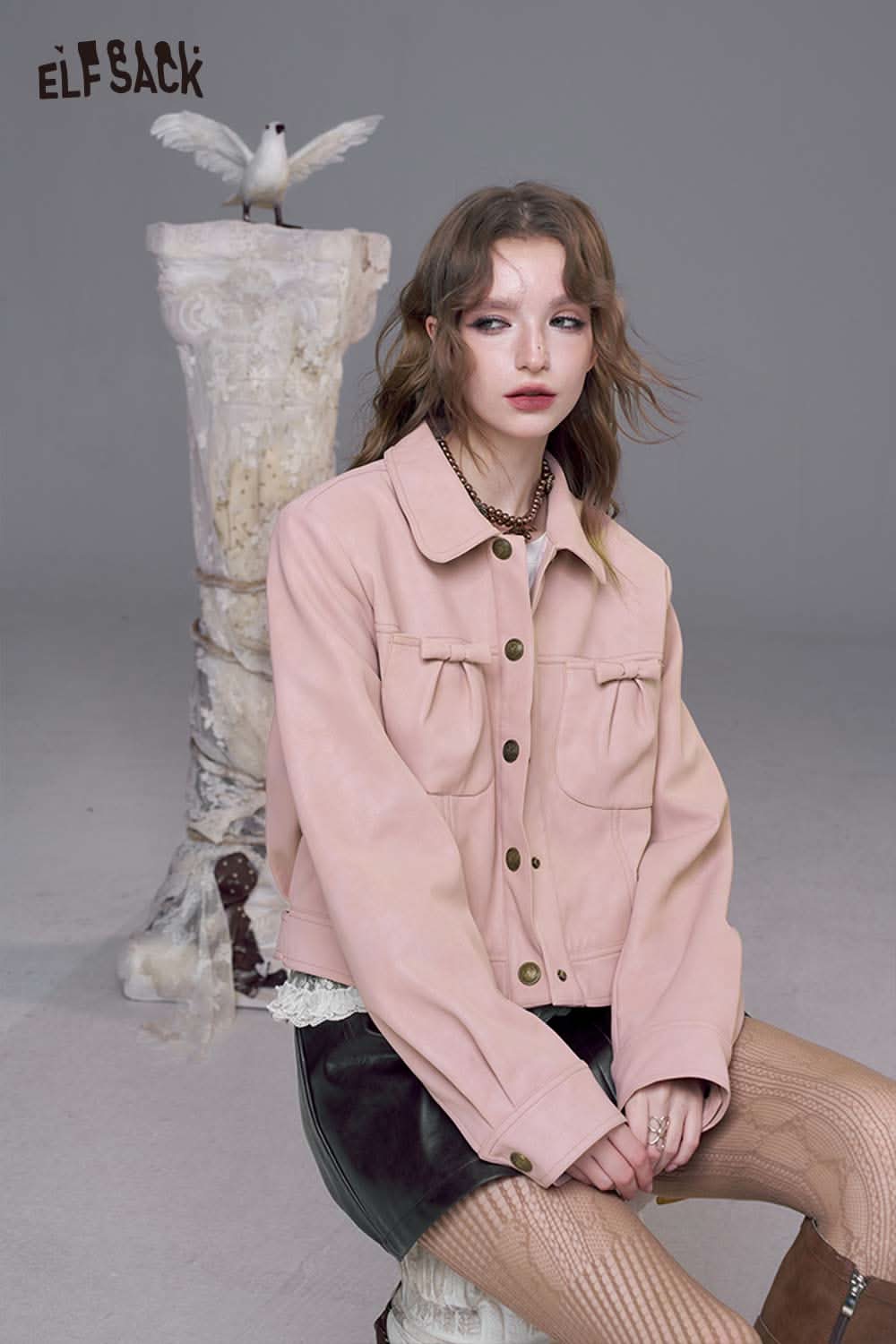 ELFSACK pink faux leather motocross jacket featuring a stylish button-up design and chic pockets