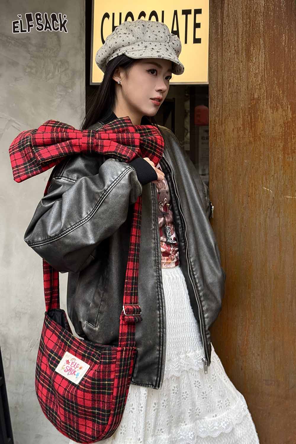 Fashionable plaid bow crossbody bag paired with a stylish jacket and accessories for a trendy look