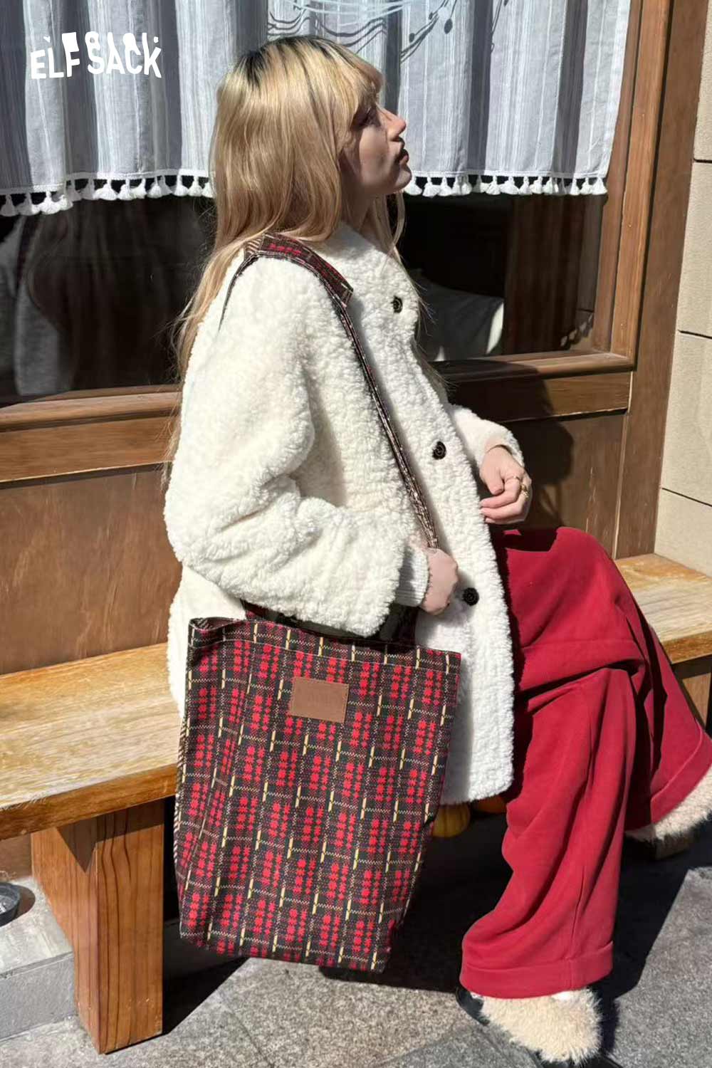 ELFSACK plaid cartoon crossbody bag styled with a cozy white coat for a chic look