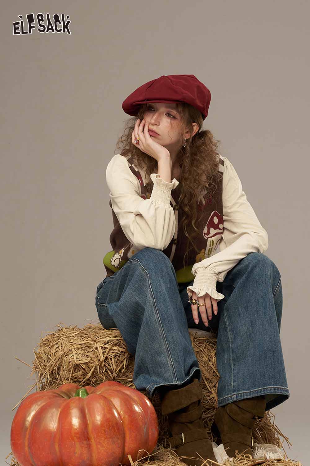 ELFSACK plaid knit sweater for women styled with a beret and relaxed jeans