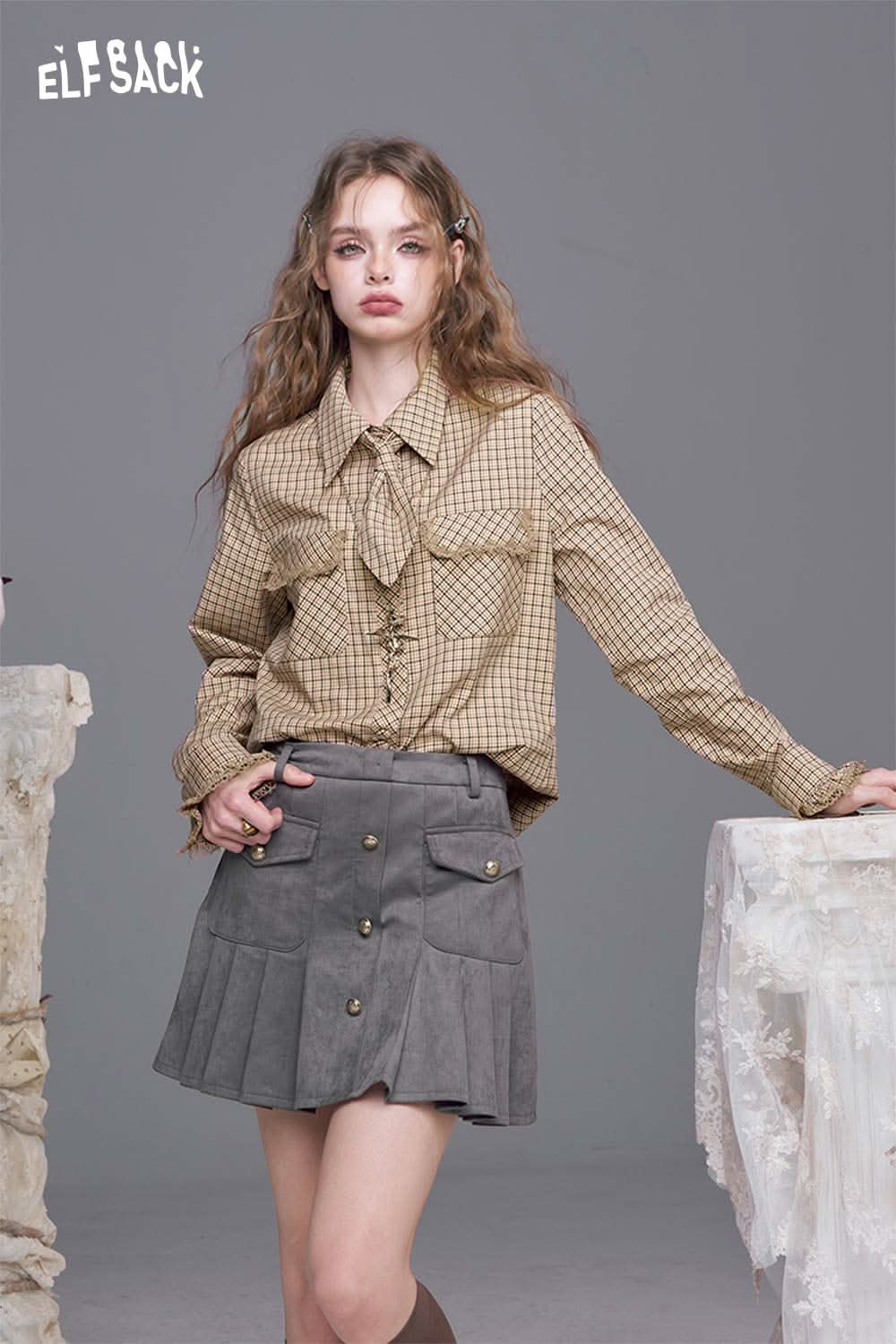 ELFSACK plaid lace accent long sleeve shirt paired with a stylish gray pleated skirt
