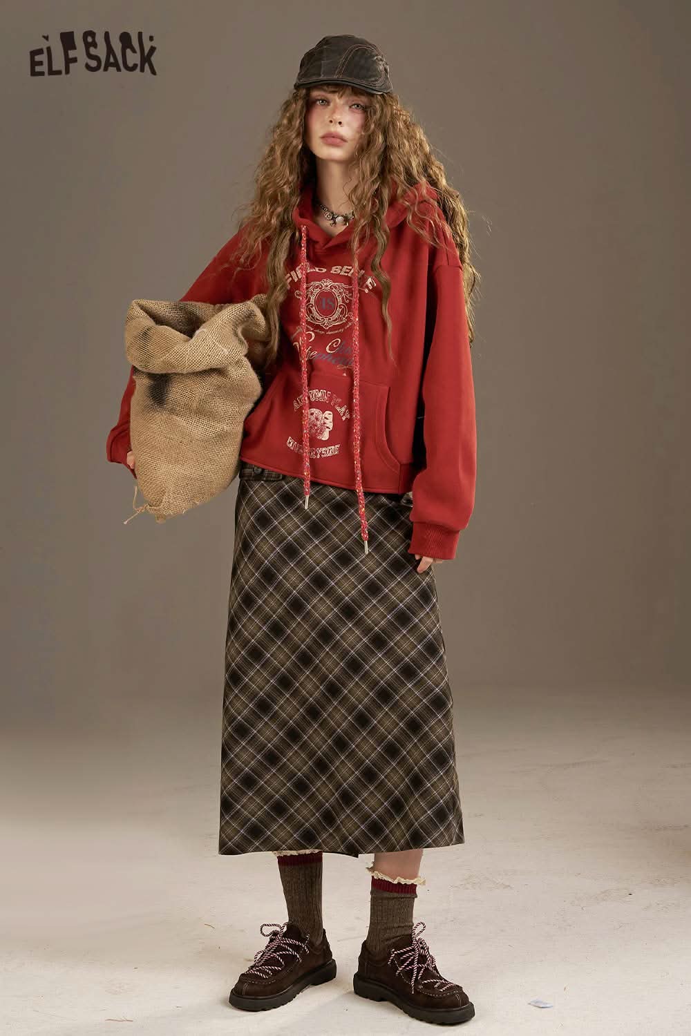 ELFSACK plaid straight long skirt paired with a red oversized hoodie for a trendy casual look