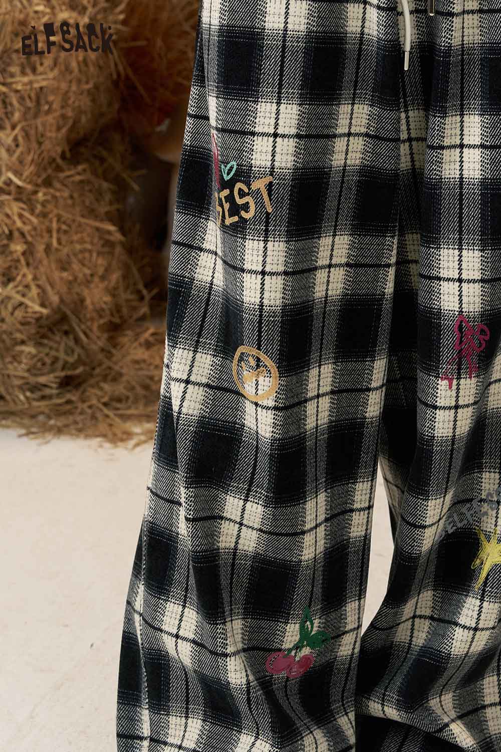 ELFSACK plaid wide leg pants for women featuring colorful embroidered designs on a black and white pattern