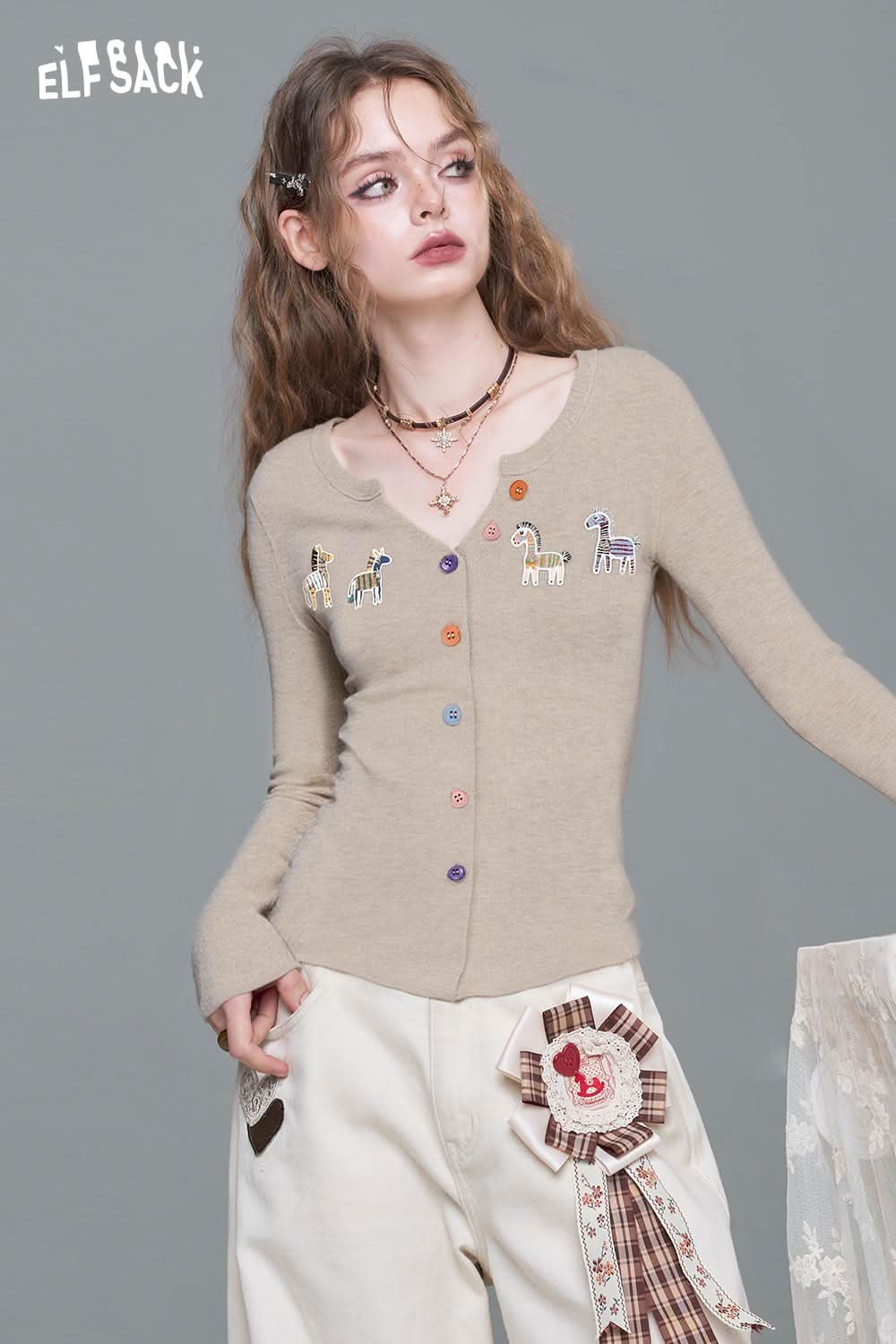 ELFSACK playful animal motif cardigan in beige with colorful buttons and embroidered designs