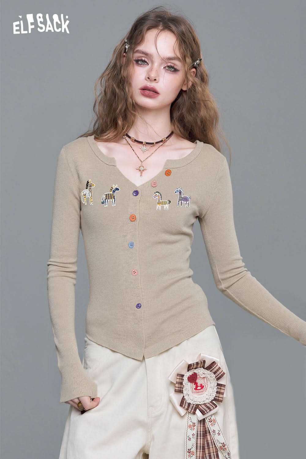 ELFSACK playful animal motif cardigan in beige with colorful buttons and cute animal designs