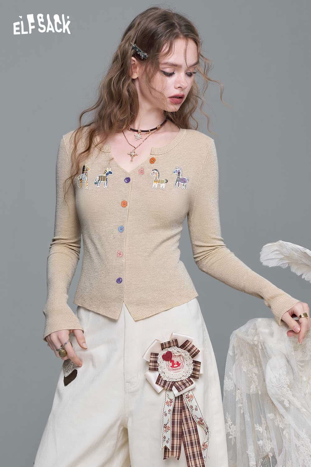 ELFSACK playful animal motif cardigan in beige with colorful buttons and whimsical embroidery