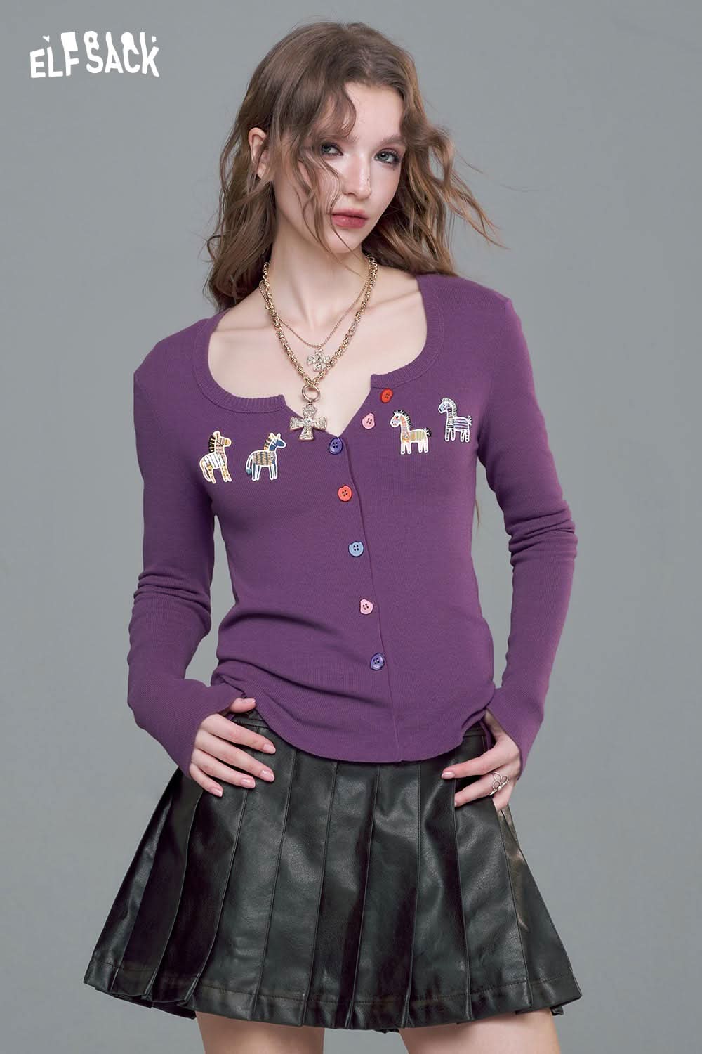 ELFSACK playful animal motif cardigan in purple with colorful button details and whimsical animal designs
