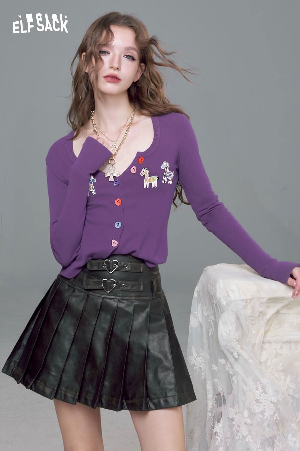 ELFSACK playful animal motif cardigan in purple with colorful buttons and embroidered designs